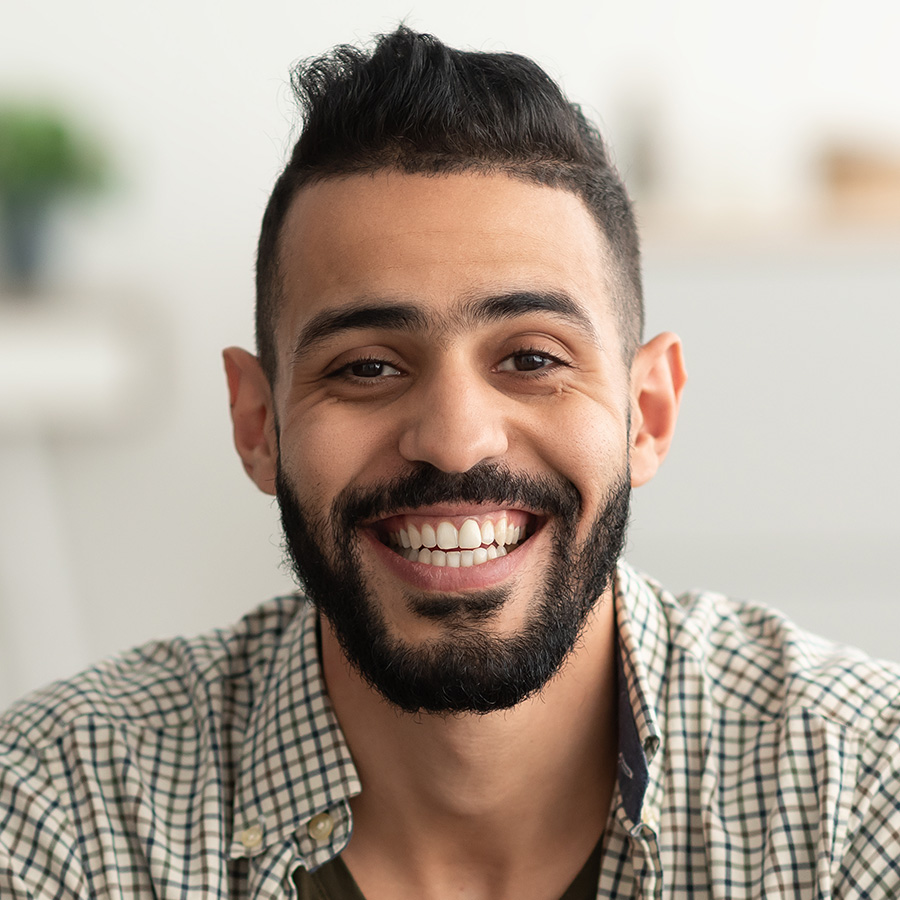 portrait-of-handsome-young-arab-man-smiling-and-lo-XHBVC4Z.jpg